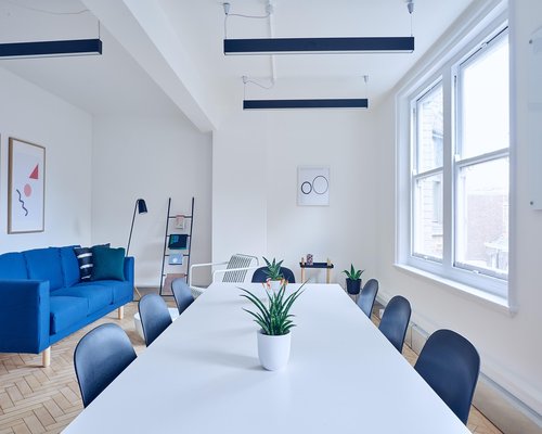 Natural light entering a modern Mexican apartment workspace